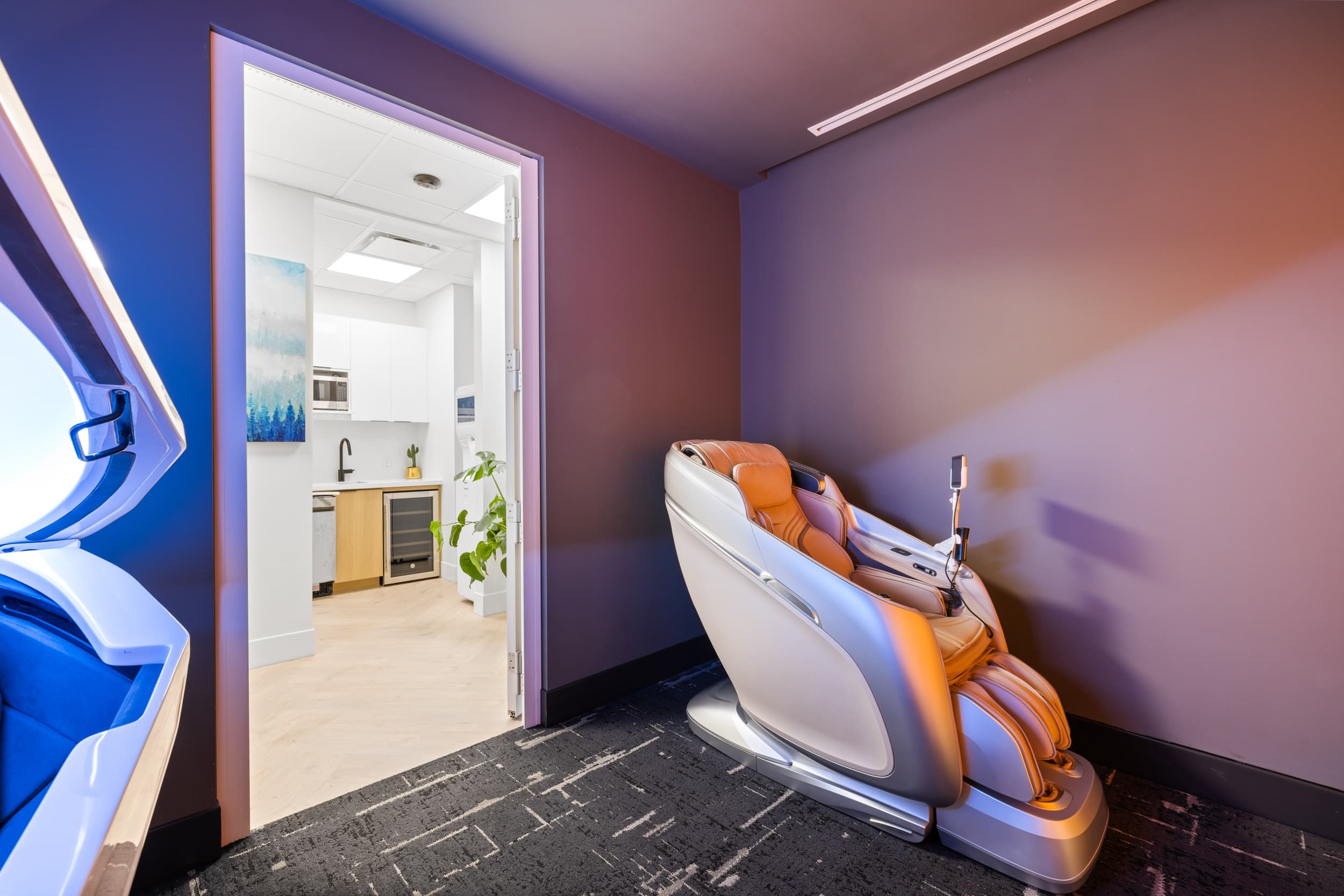 Full-body massage chair in the relaxation room