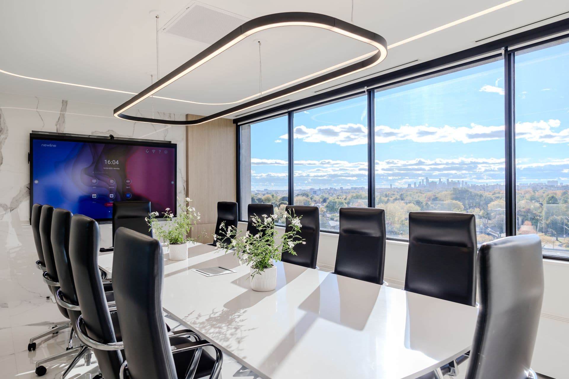 Smart boardroom with large display and professional meeting setup