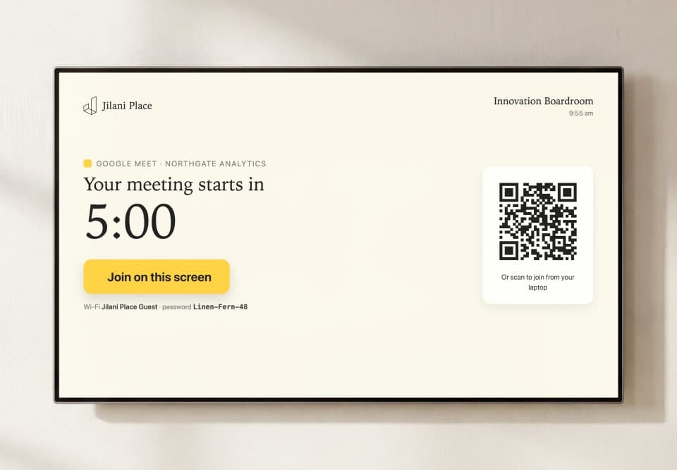 The Innovation Boardroom screen counting down to a meeting, with a join button and a QR code