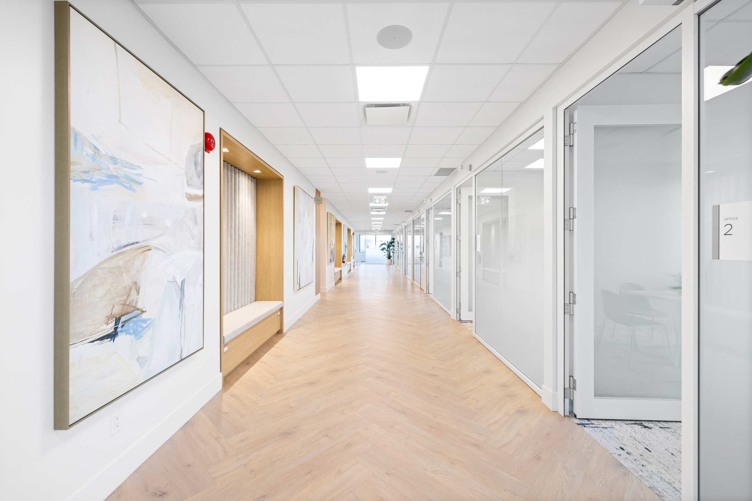 Bright hallway at Jilani Place leading into the workspace