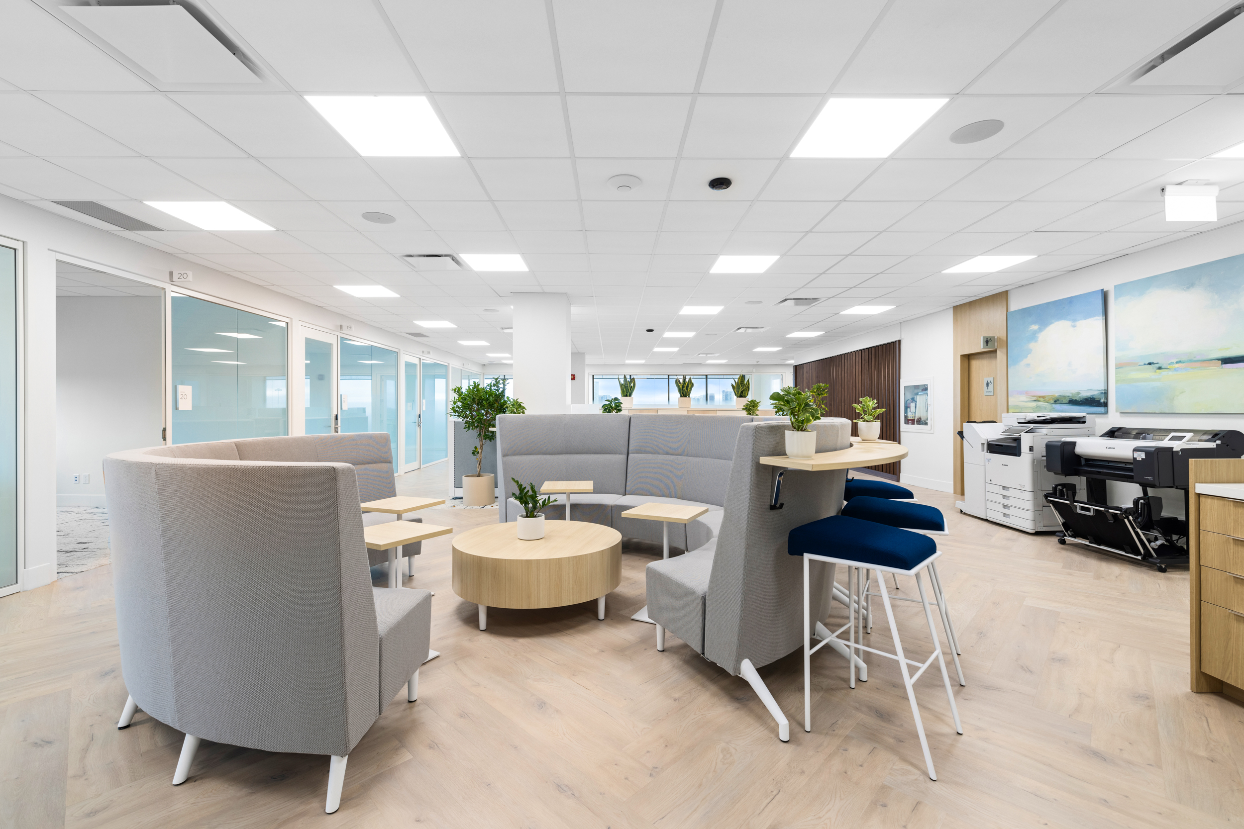 Open coworking floor with natural light and desks at Jilani Place
