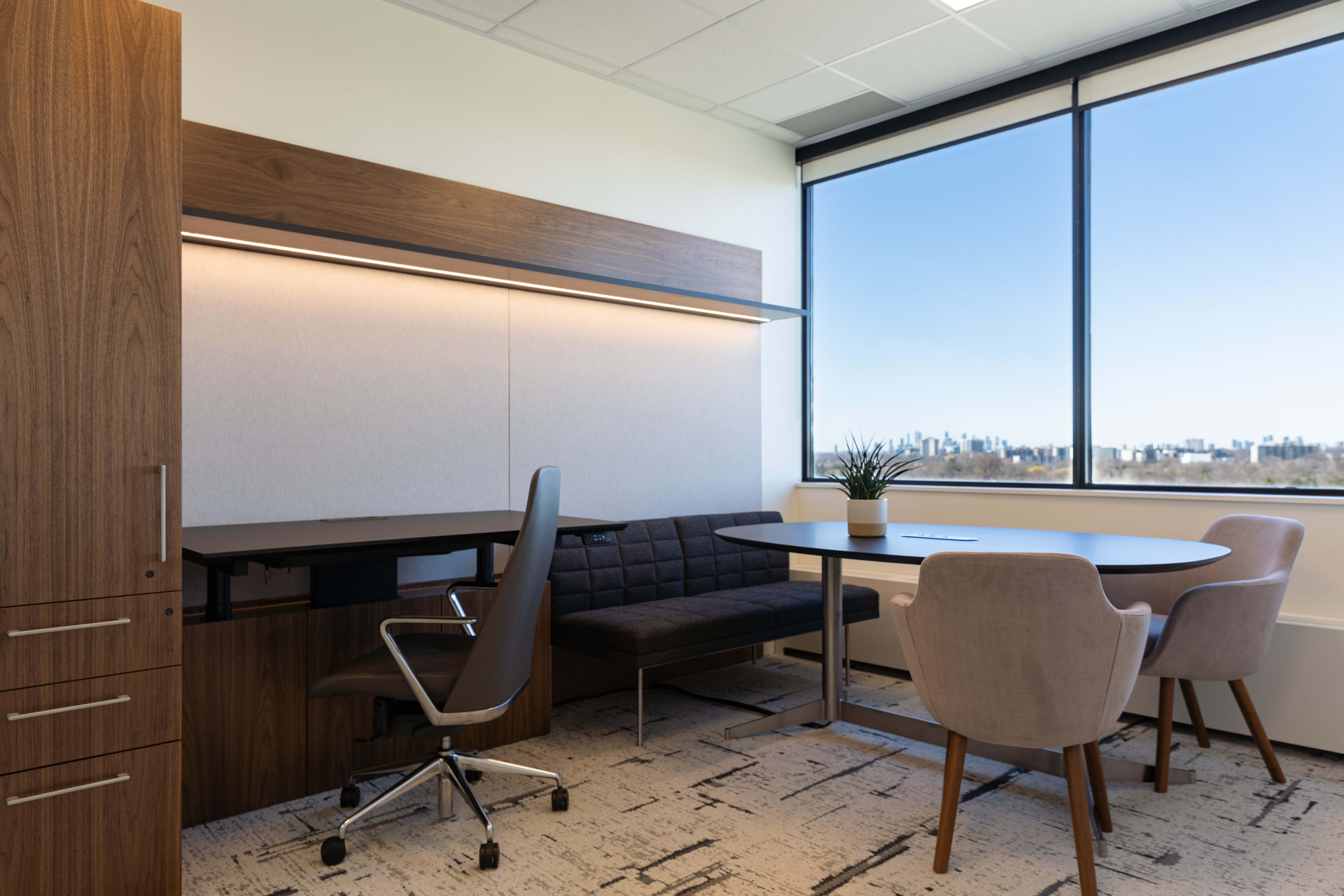 Furnished private office workspace with windows at Jilani Place, Etobicoke